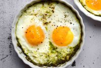 Pesto Baked Eggs with Cherry Tomatoes and Parmesan