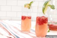 Raspberry Lime Champagne Cocktail with Fresh Herb Infusion