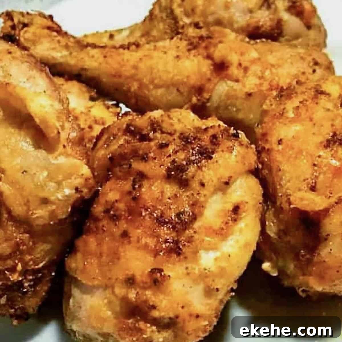 Golden and crispy air fryer fried chicken drumsticks, perfectly seasoned and cooked to juicy perfection. An easy and healthy alternative to traditional fried chicken recipes.