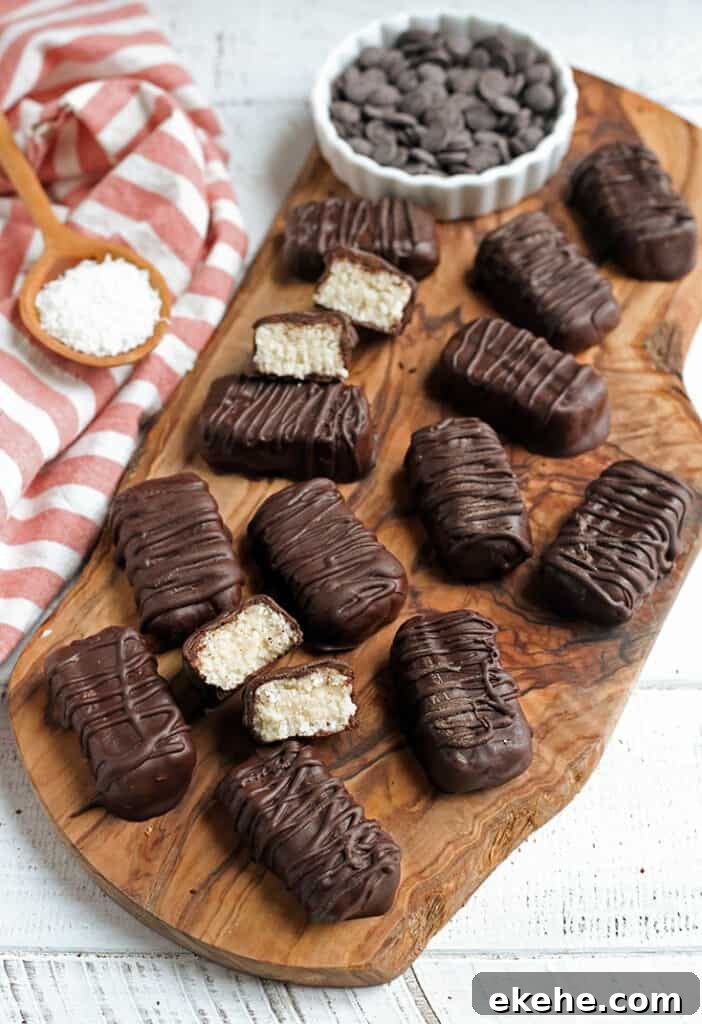 multiple paleo vegan mounds on a wooden cutting board