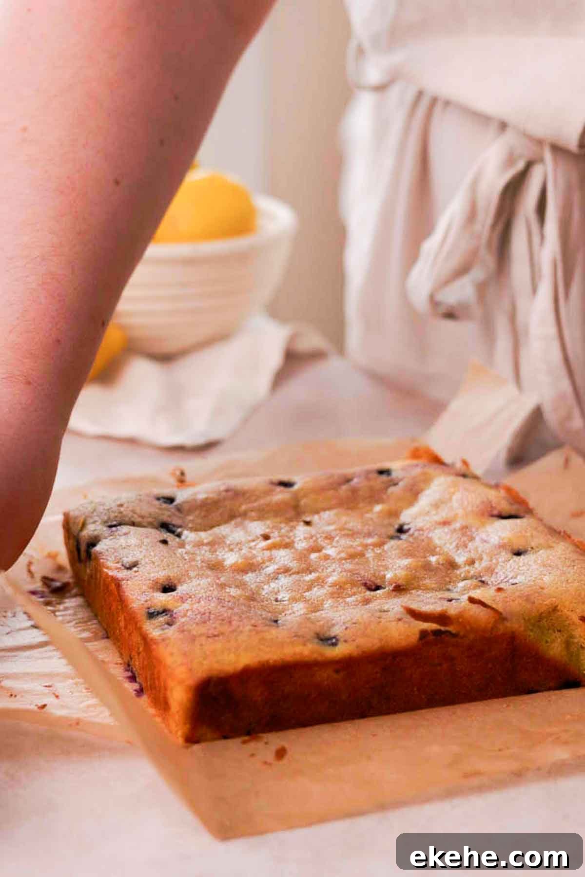baked blueberry brownies on parchment paper