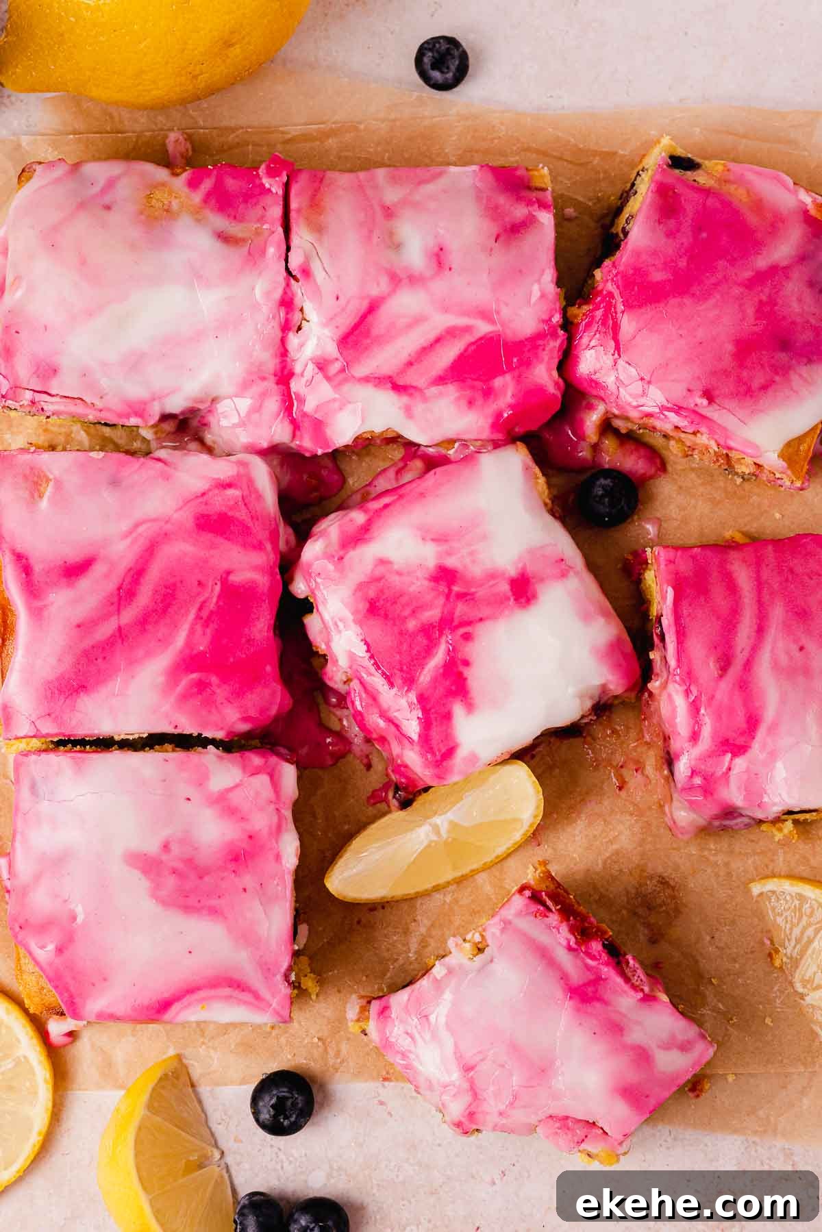 glazed blueberry brownies with swirled white and purple glaze