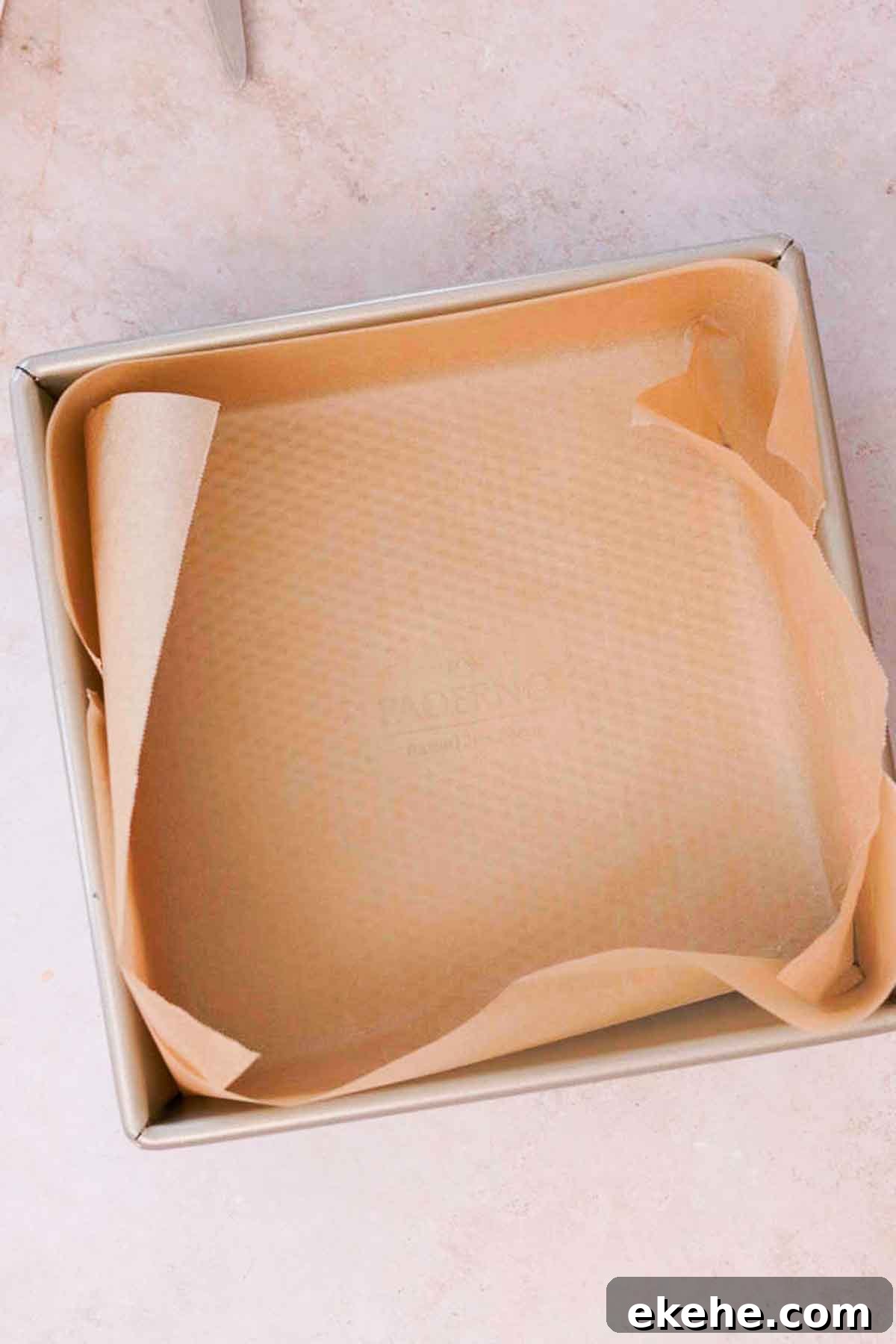 lining square baking pan with parchment paper