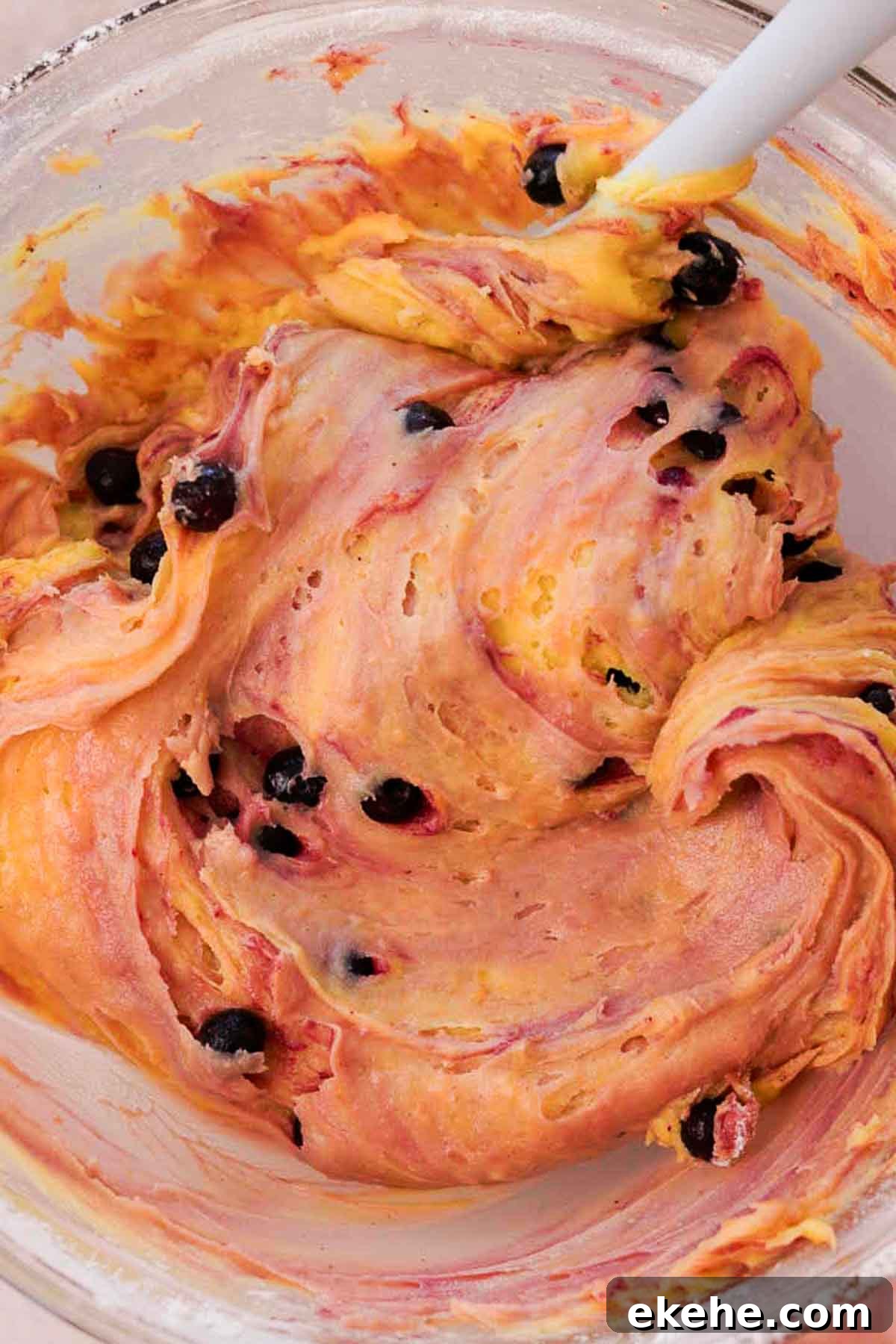 folded brownie batter with blueberries