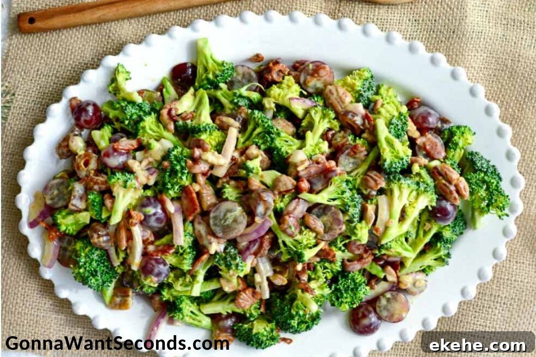 broccoli salad recipe with bacon in an oval serving plate