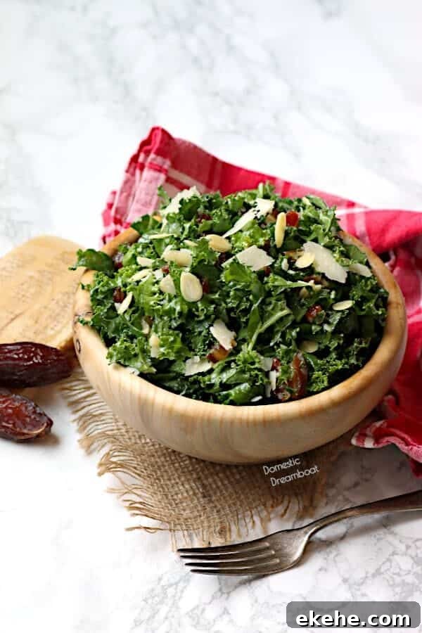 Kale and date salad in a wood bowl.