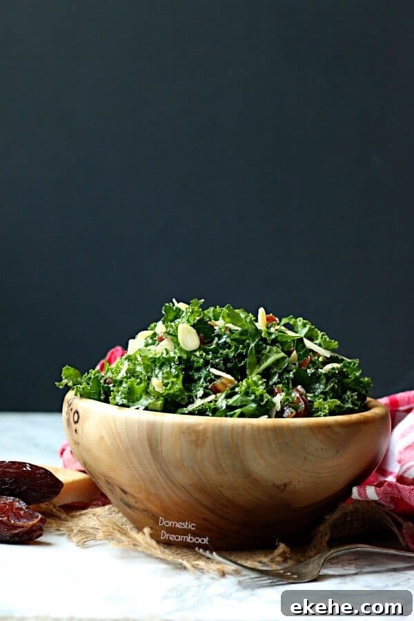 Kale and date salad in a wood bowl.