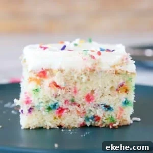 detailed texture of funfetti cake with frosting.
