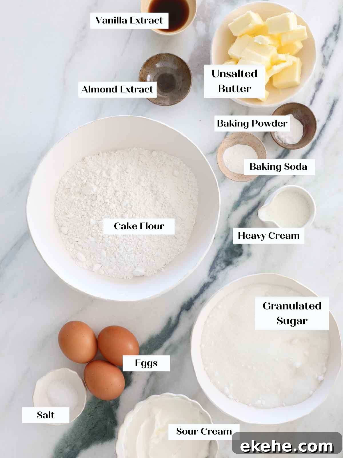 moist vanilla cake ingredients on marble.