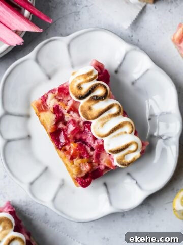 Lemon rhubarb bar on a white plate.