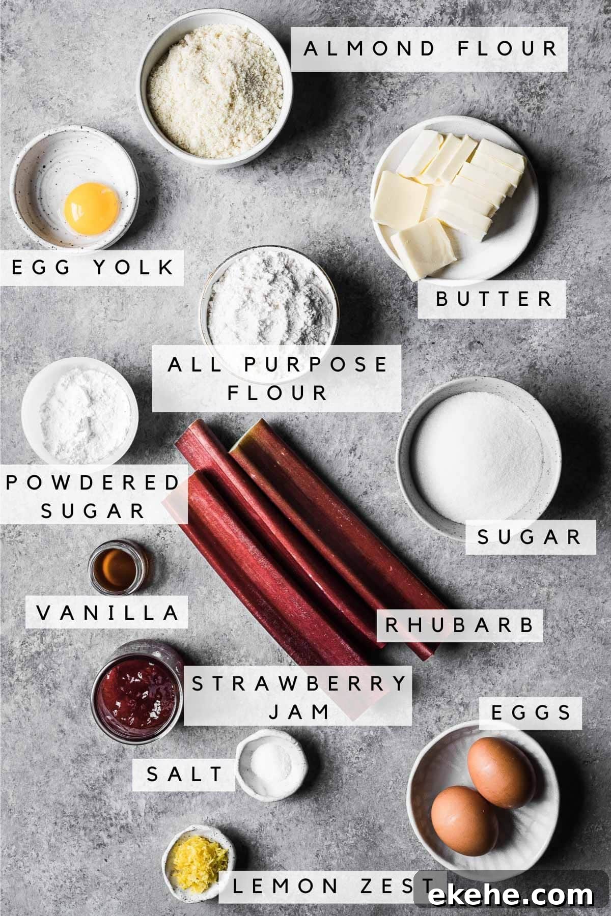 Labeled ingredients in bowls for rhubarb frangipane tart.