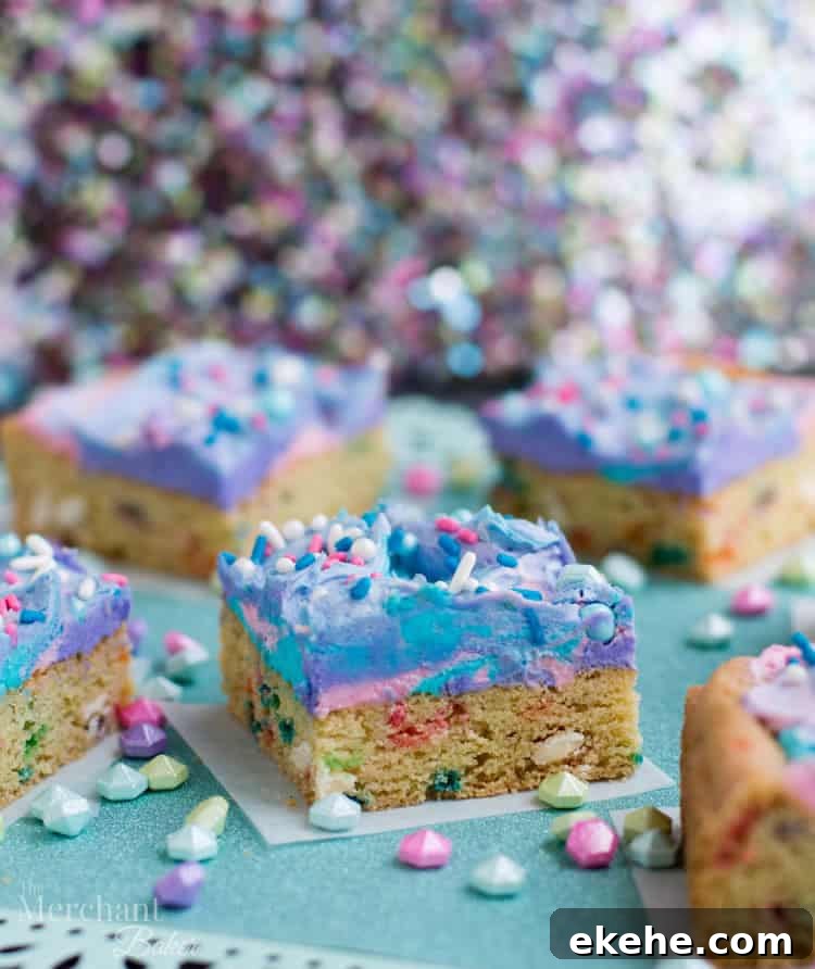 Mermaid Birthday Sugar Cookie Bars. Birthday cake flavored sugar cookie bars, topped with colorful swirls of frosting and festive sprinkles.