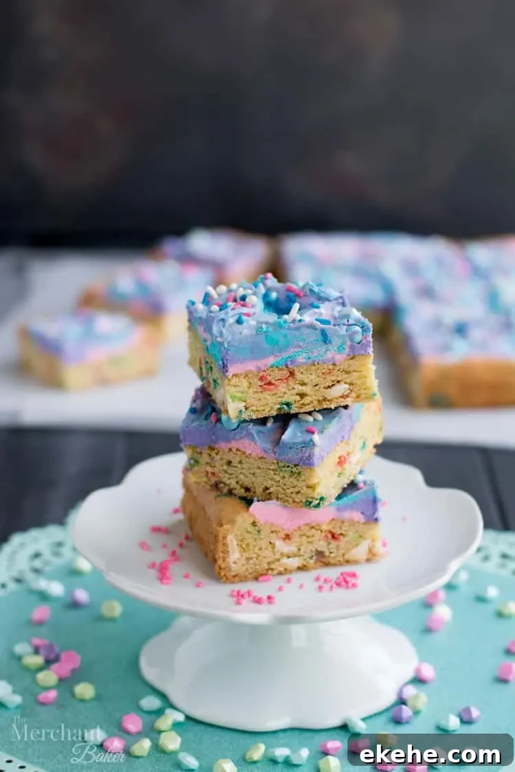 Mermaid Birthday Sugar Cookie Bars. Birthday cake flavored sugar cookie bars, topped with colorful swirls of frosting and festive sprinkles.