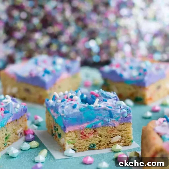 Mermaid Birthday Sugar Cookie Bars. Birthday cake flavored sugar cookie bars, topped with colorful swirls of frosting and festive sprinkles.
