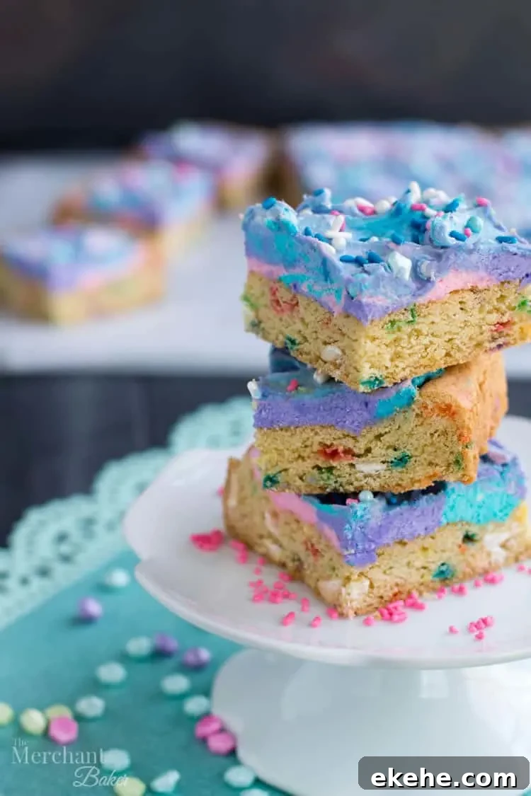 Mermaid Birthday Sugar Cookie Bars. Birthday cake flavored sugar cookie bars, topped with colorful swirls of frosting and festive sprinkles.
