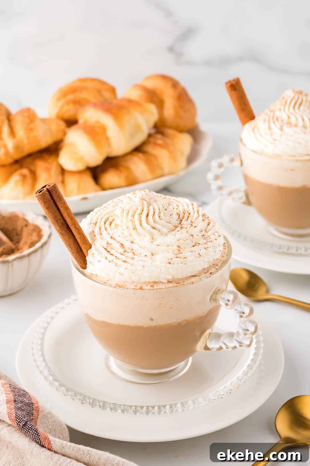 Cinnamon cappuccino on a plate.