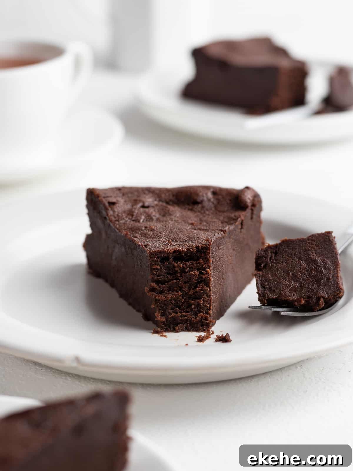 A single slice of French chocolate fondant cake on a dessert plate