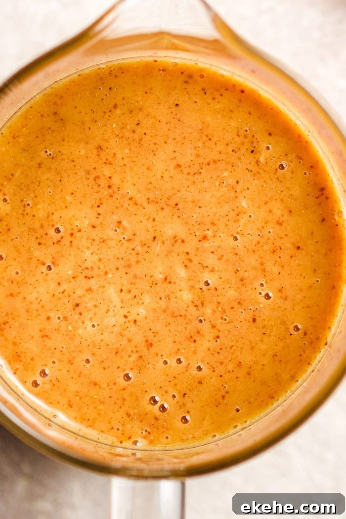 A close shot to show the texture of the creamy Asian peanut dressing