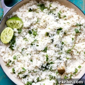 Cast iron pot filled with cooked white cilantro lime rice.