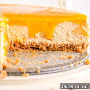 The cheesecake cut to show the interior texture.