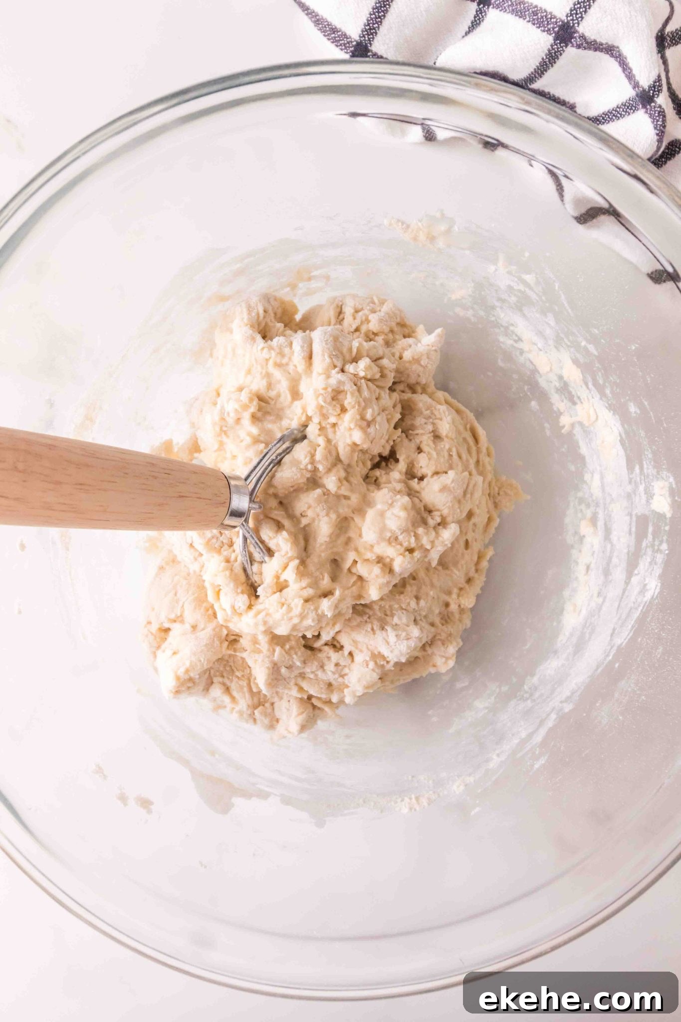A Danish whisk mixing homemade bread dough - Hostess At Heart