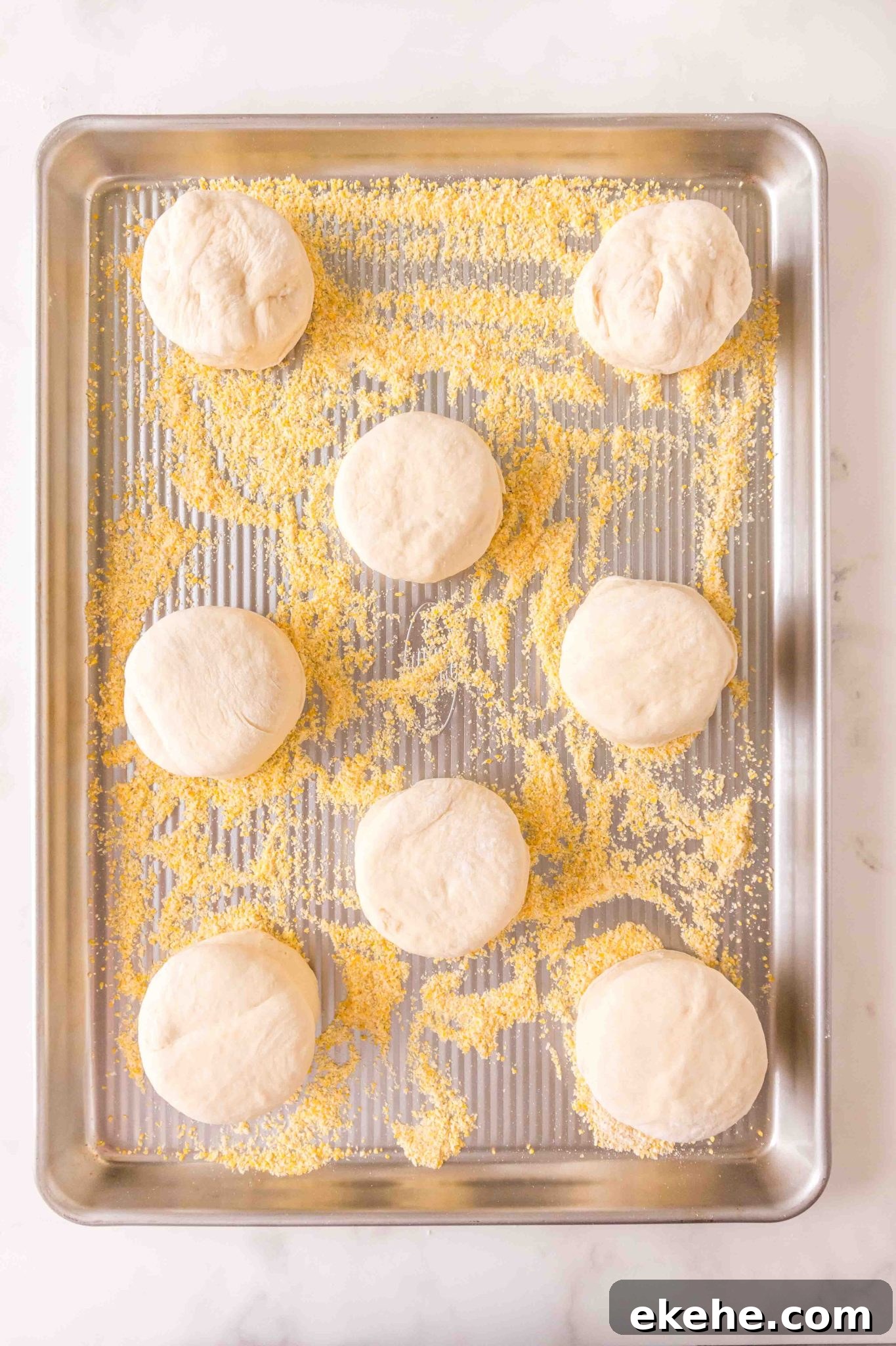 Cut dough on a baking sheet sprinkled with cornmeal to prevent sprinkling - Hostess At Heart