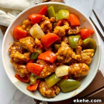 overhead view of sweet and sour pork on plate.
