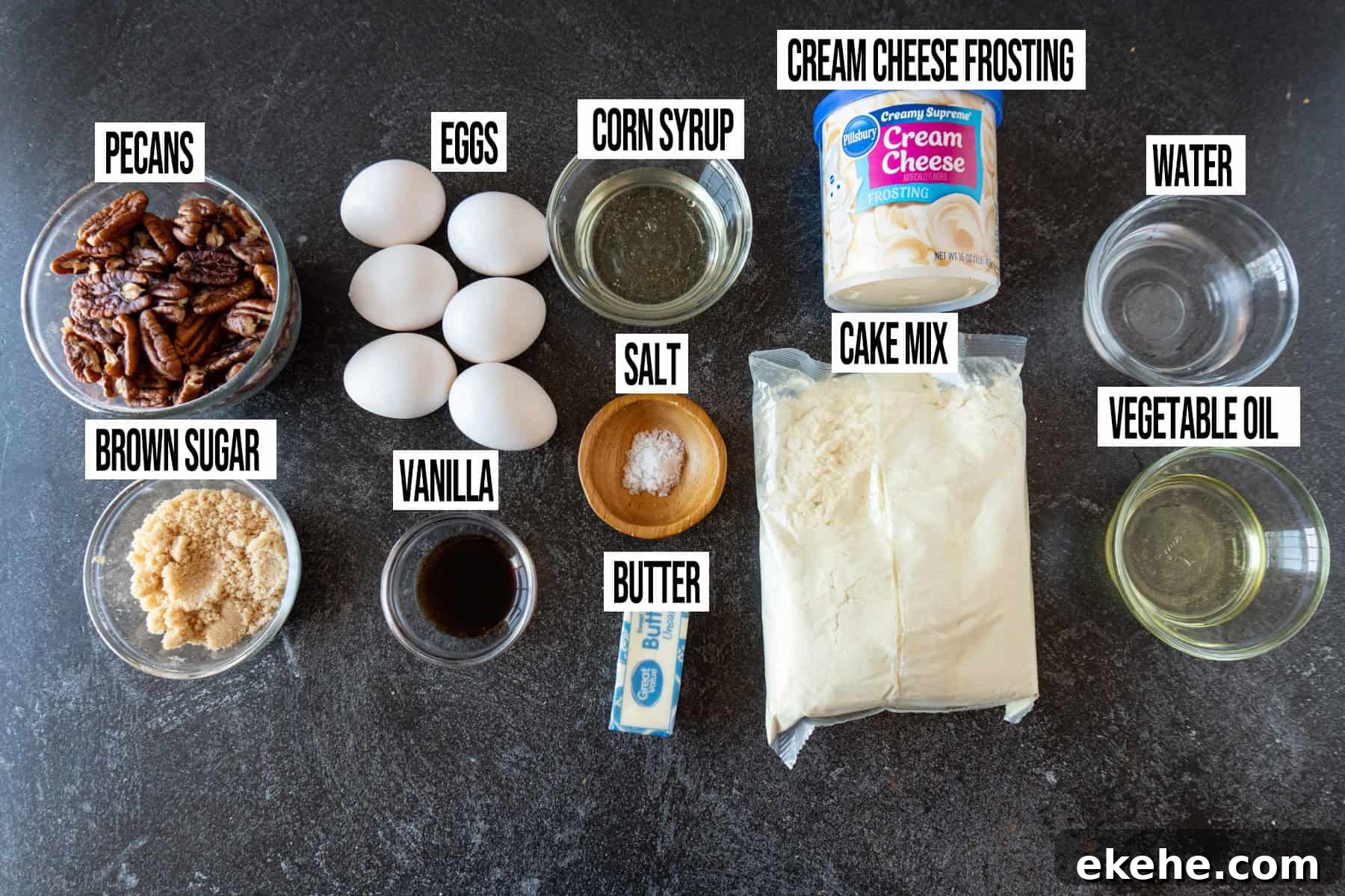 Pecan Pie Cake ingredients laid out and in individual bowls and labeled.