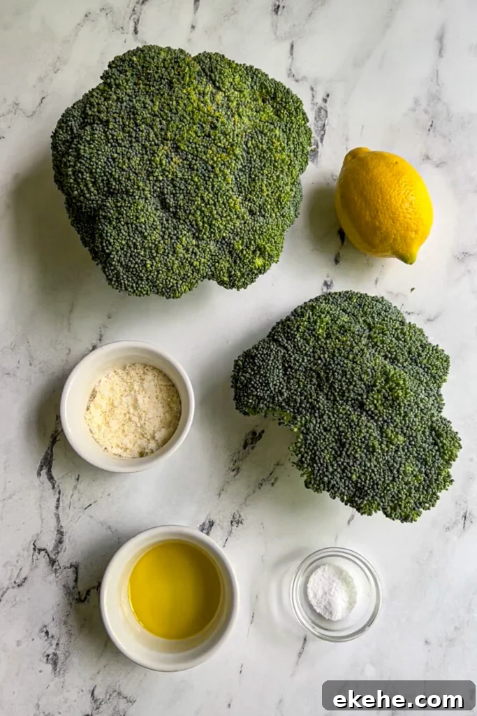 Ingredients needed to make air fryer broccoli laid out on a table top.