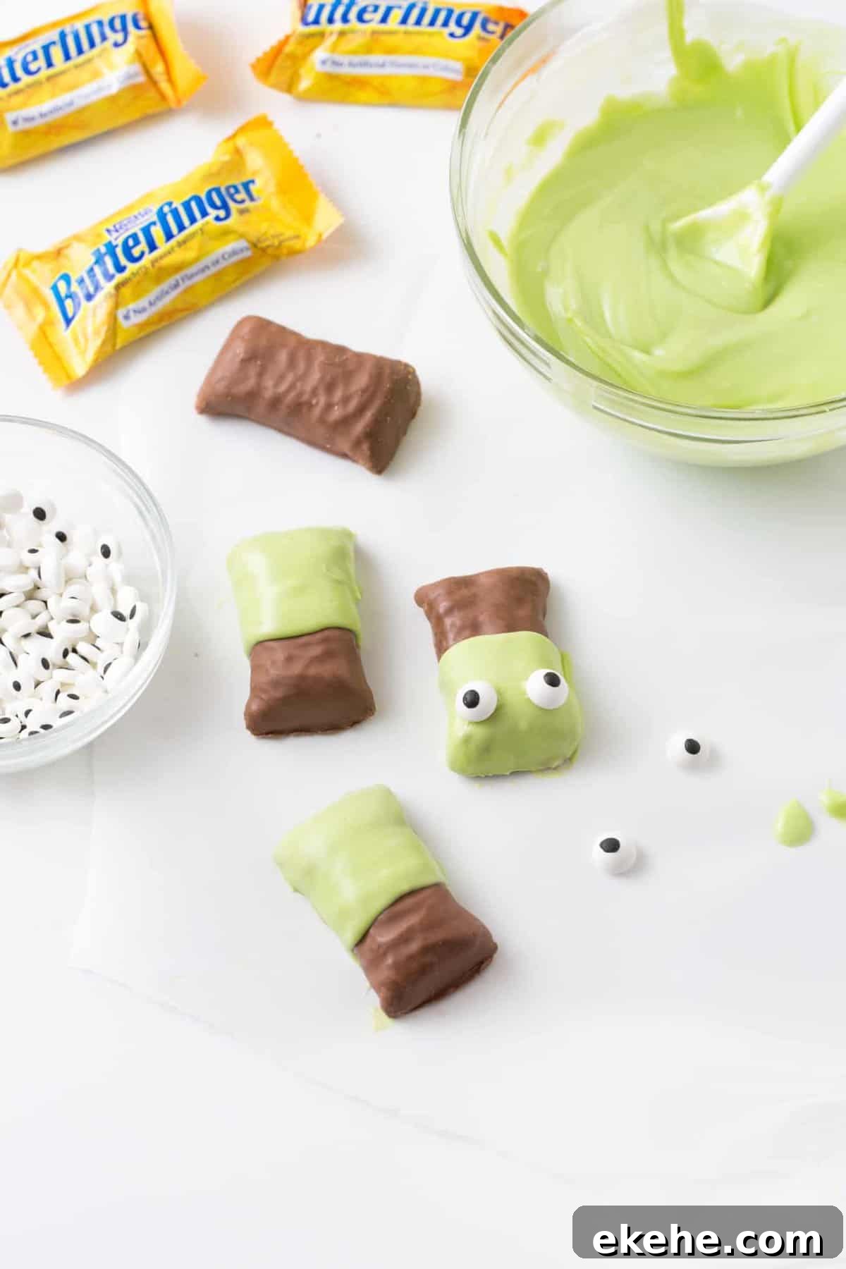 Butterfinger candy bars dipped in melted green almond bark then decorated with candy eyeballs on top to look like Frankenstein.