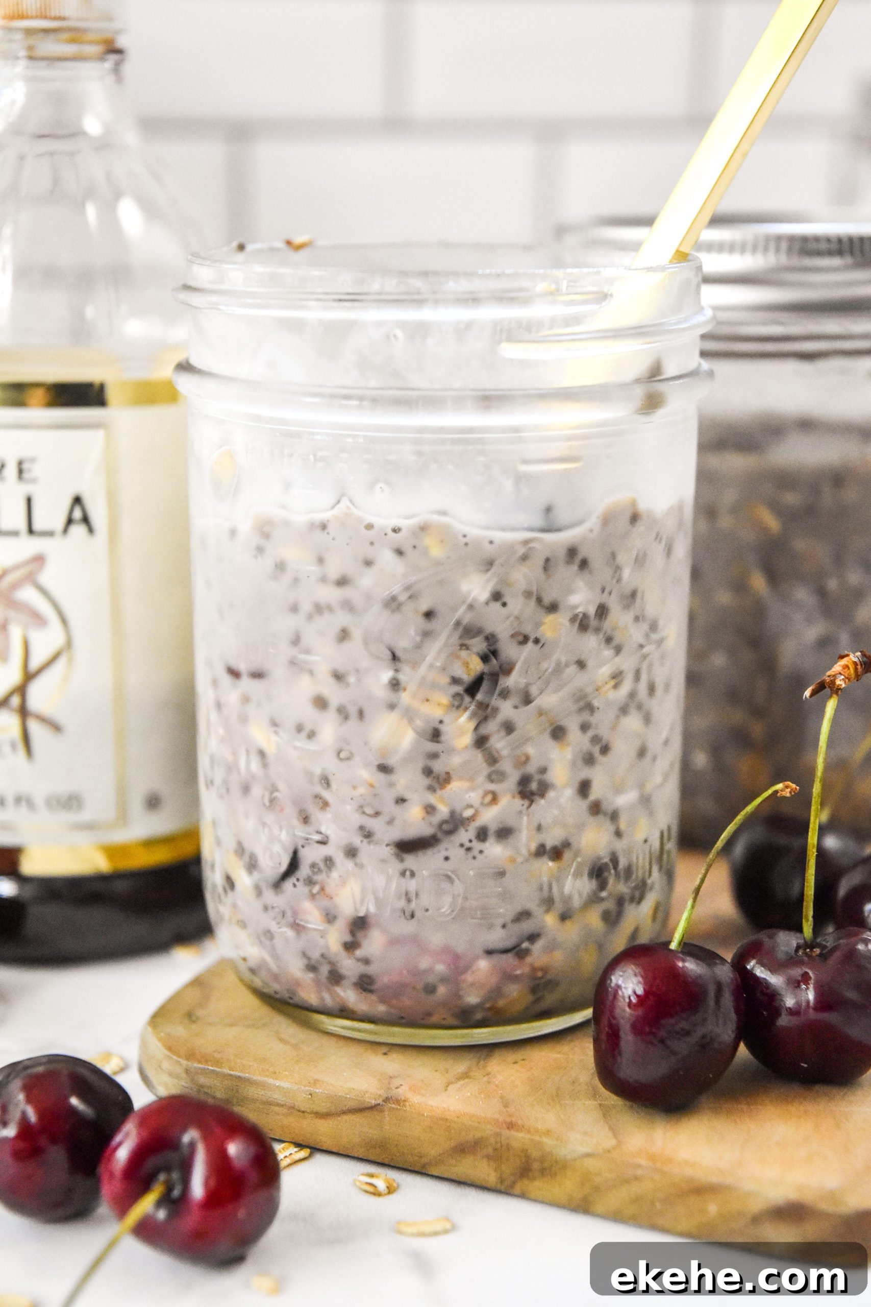 cherry vanilla overnight oats in a mason jar.