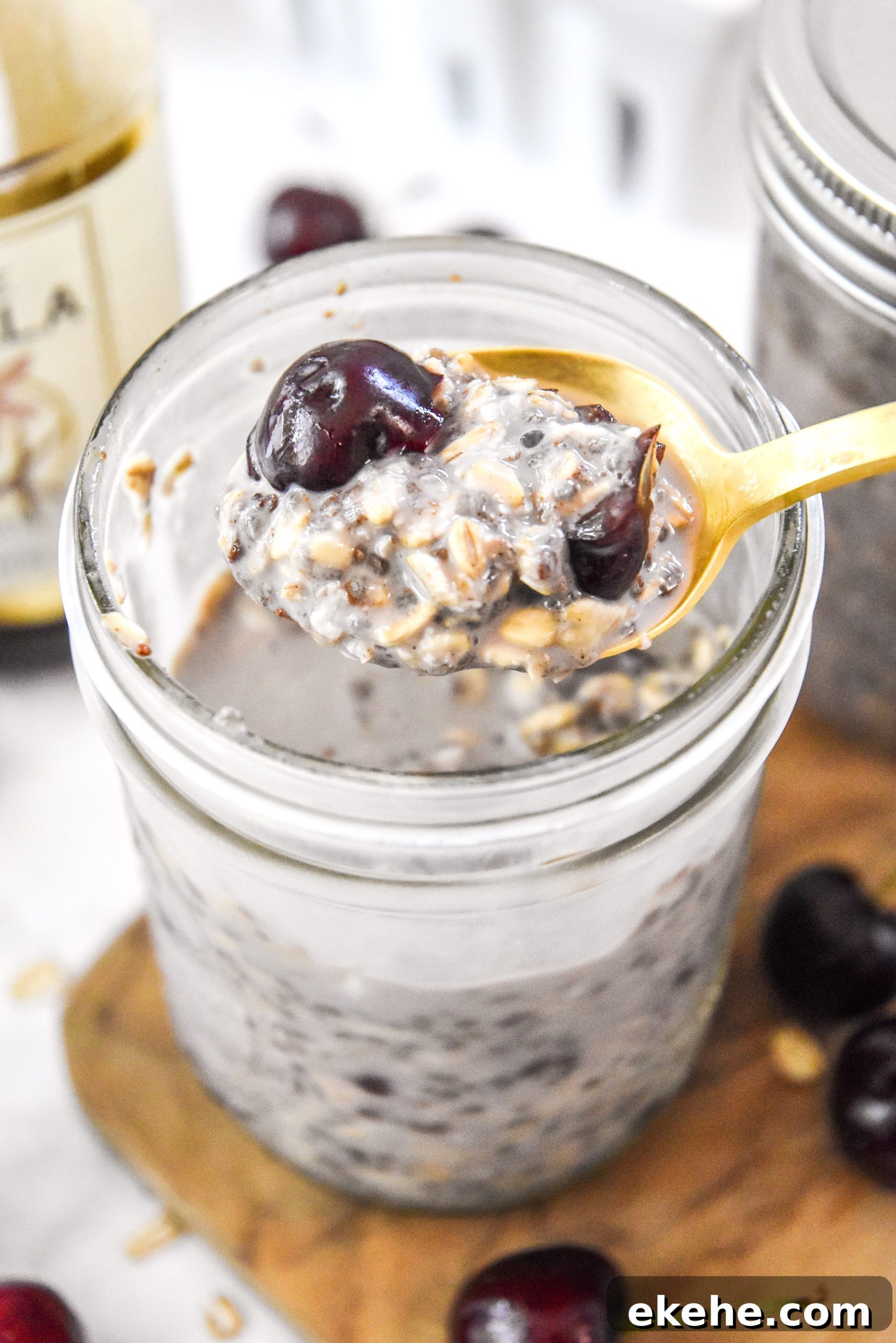 a spoonful of cherry vanilla overnight oats.