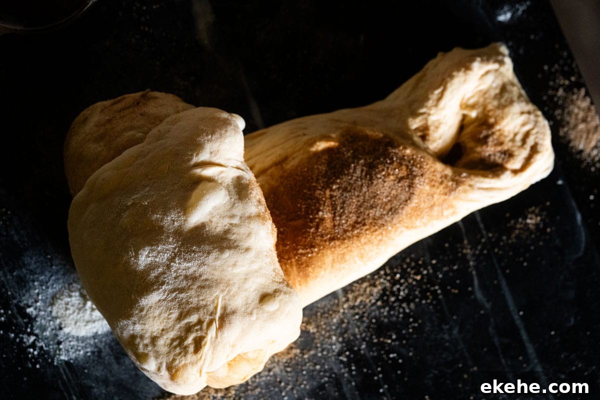 Rolling the laminated dough in order to shape it