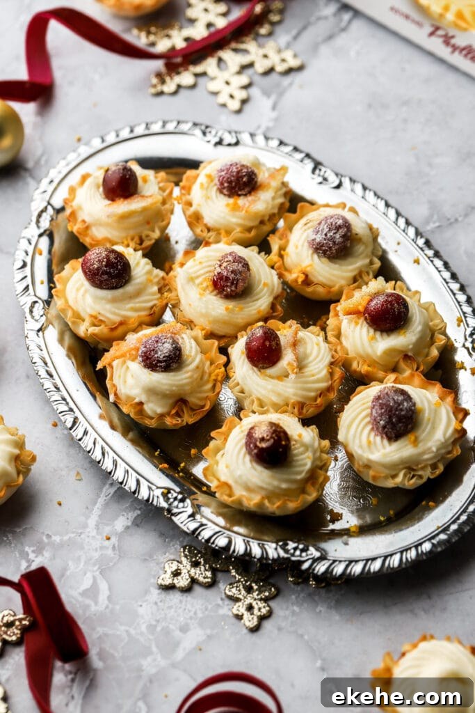 mini white chocolate cranberry cheesecakes