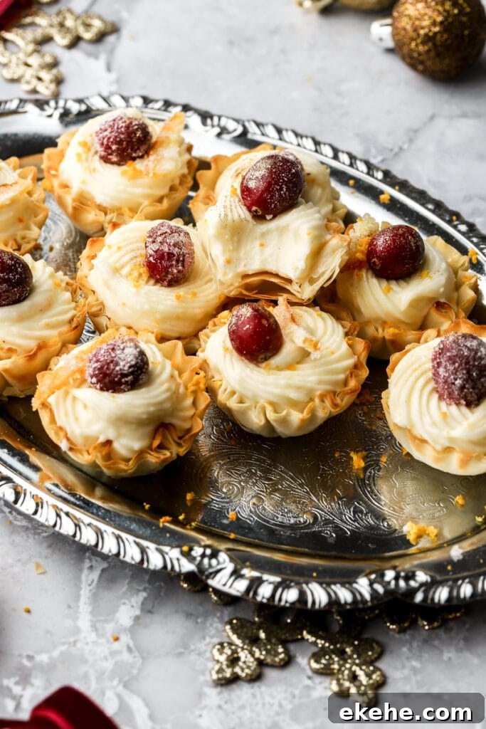 top with cranberries and orange zest