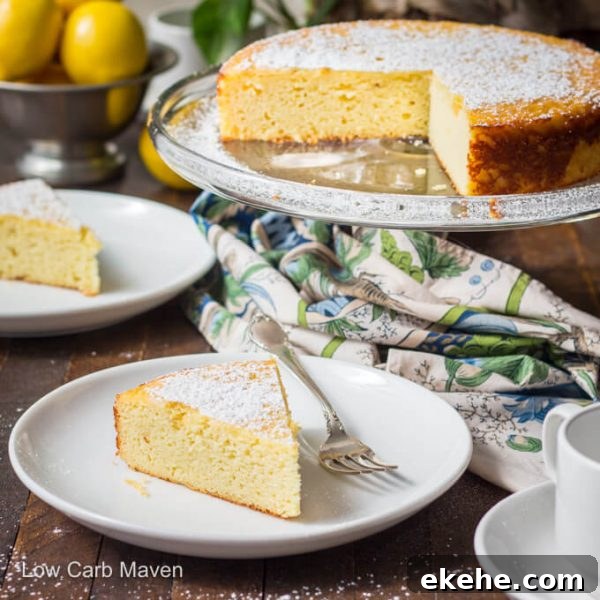 Italian lemon ricotta cake on cake stand. Slices of cake on white plates with colorful napkin to the side and lemons behind.