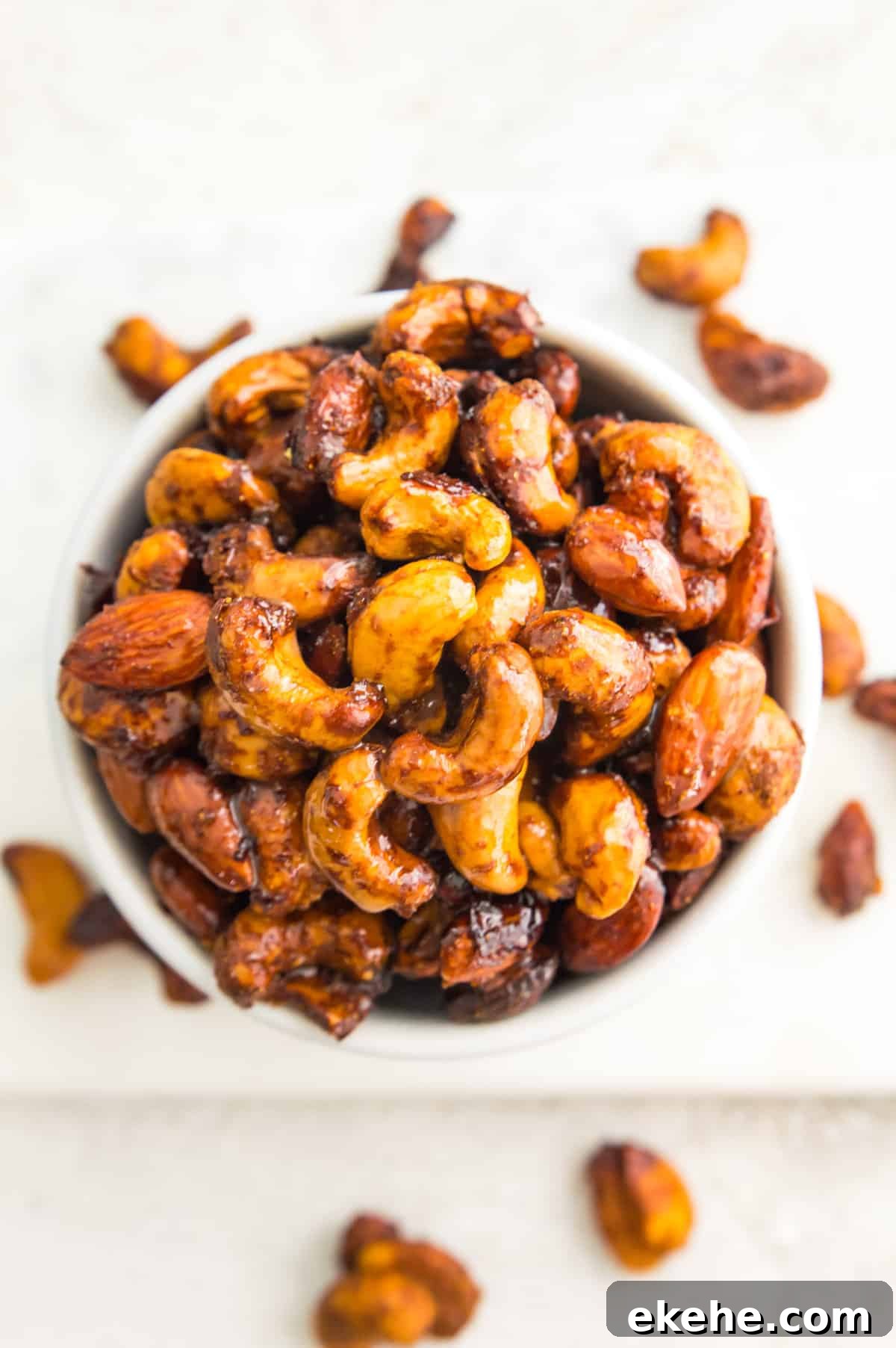 Sweet Curry-Glazed Cashews & Almonds: Spiced Snack Recipe 2 A bowl of glazed cashews and almonds.