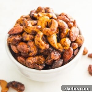 Sweet Curry-Glazed Cashews & Almonds: Spiced Snack Recipe 13 A bowl of glazed curry cashews and almonds.