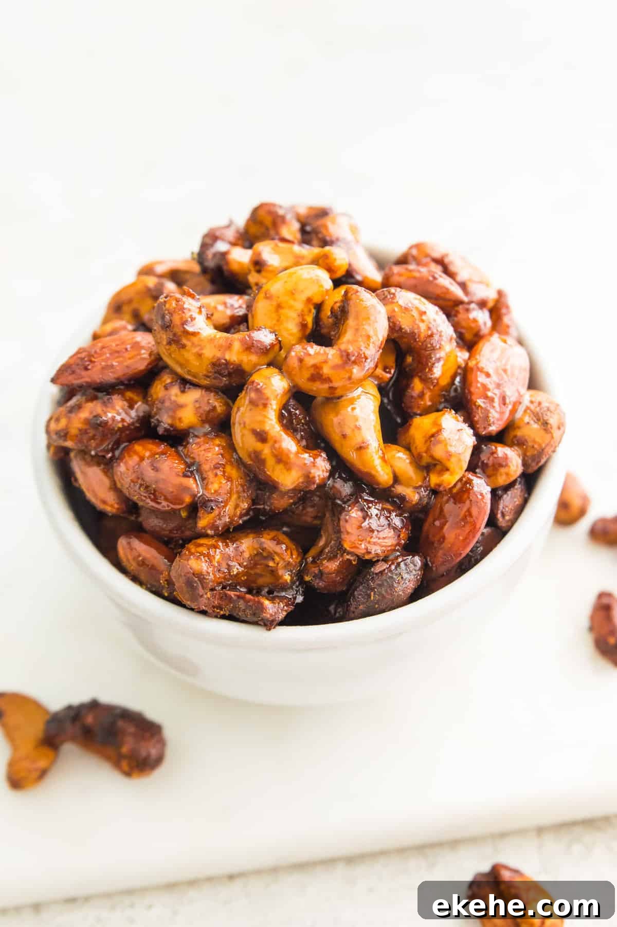 Sweet Curry-Glazed Cashews & Almonds: Spiced Snack Recipe 8 A bowl of glazed cashews and almonds.