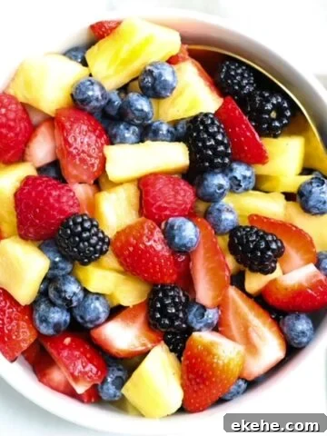 Top view of a bowl of fresh fruit salad.