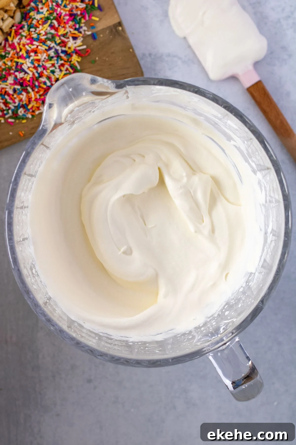 Golden Oreo vanilla ice cream base in mixing bowl.