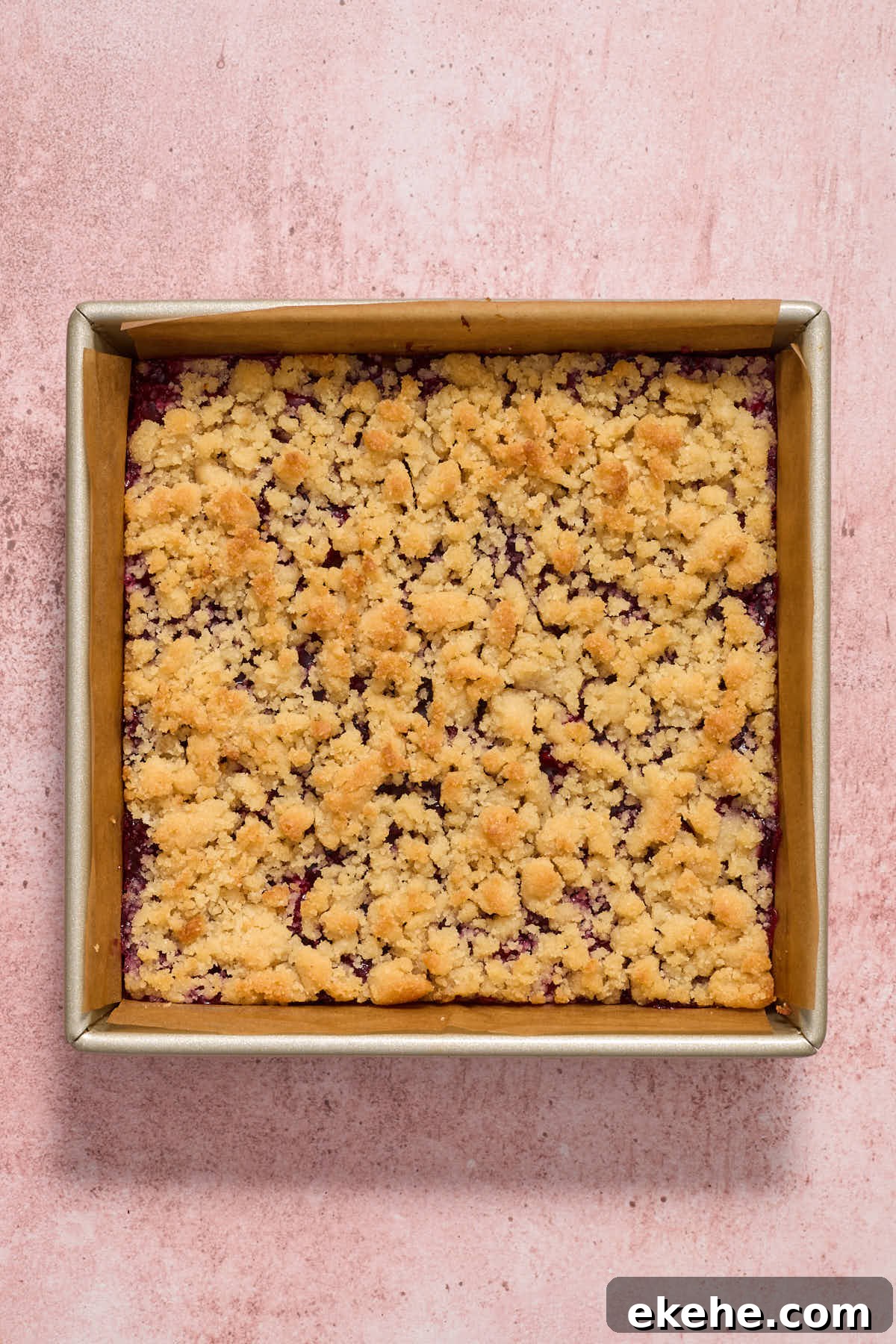 Baked cherry bars cooling in the pan.