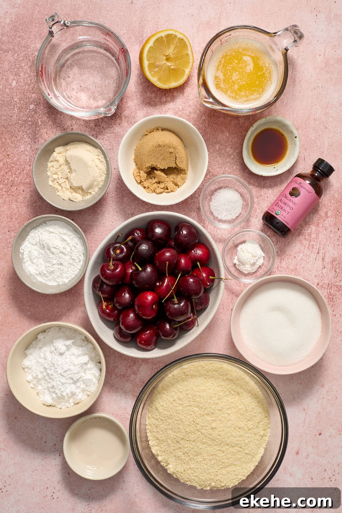 Ingredients to make cherry pie bars arranged in individual bowls.