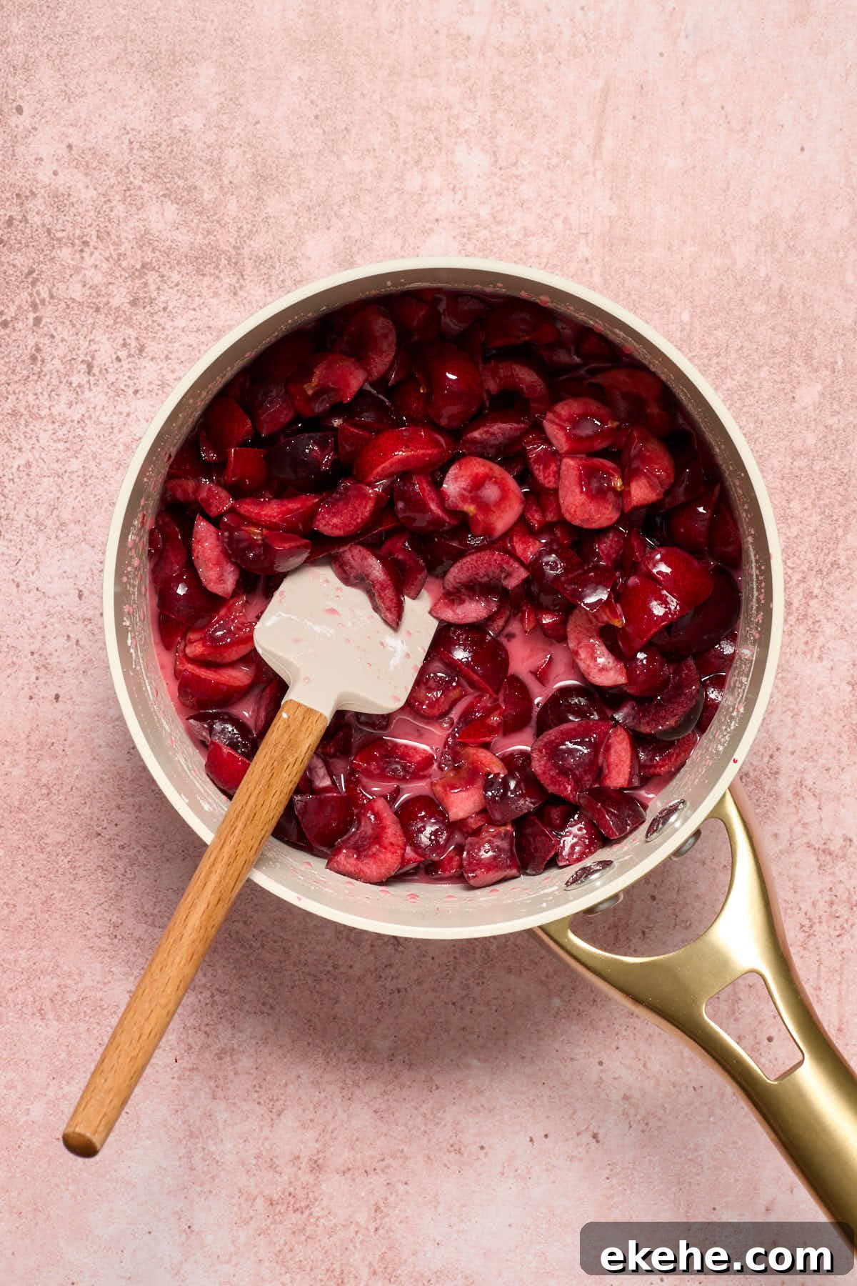 Cherry filling ingredients stirred together in a small saucepan.
