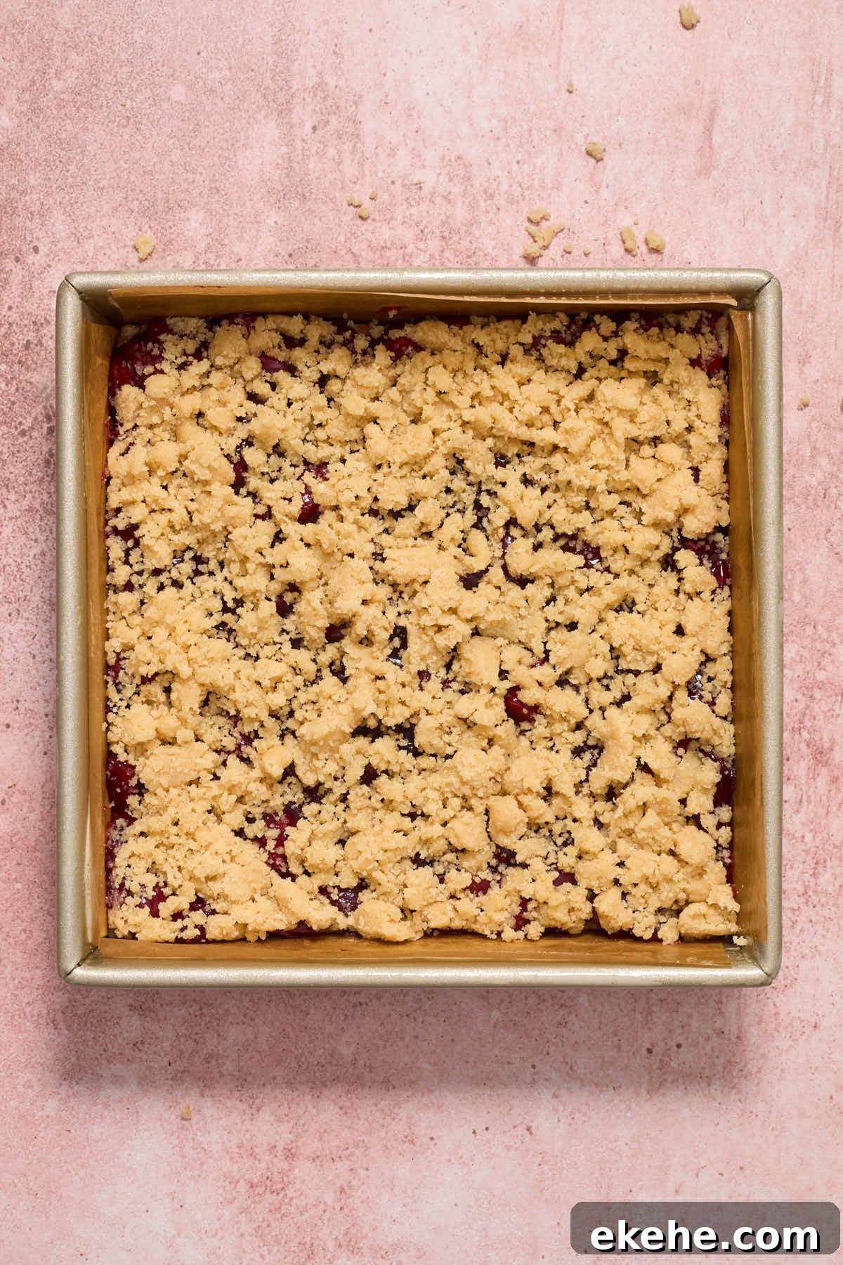 Topping sprinkled over cherry filling.