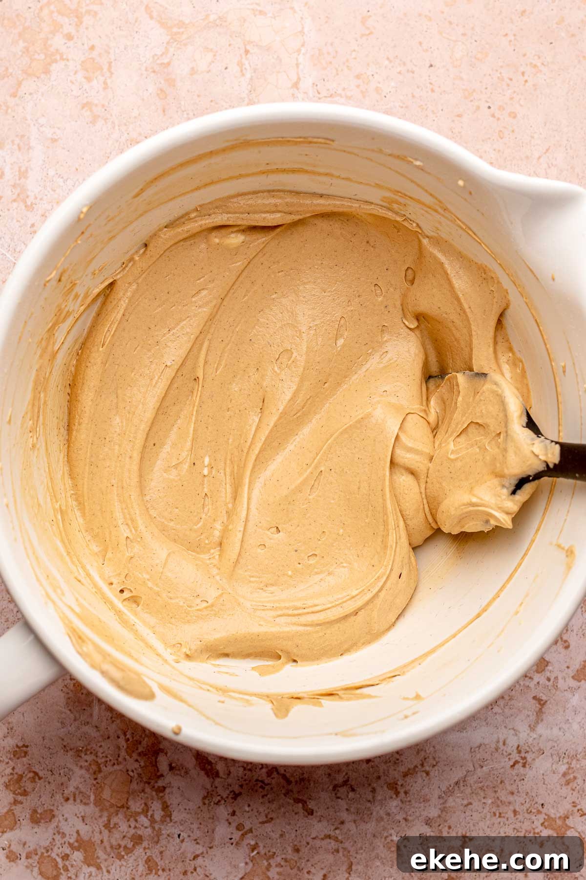 Creamed espresso frosting in a bowl.