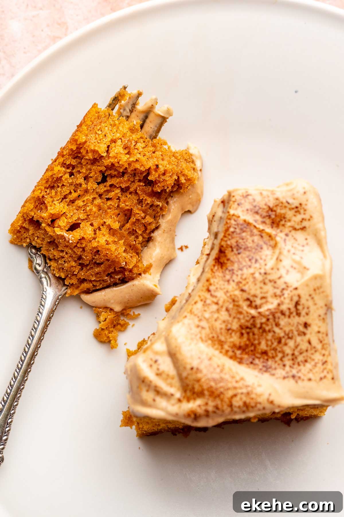 Pumpkin spice latte cake with a bite removed sitting on a fork.
