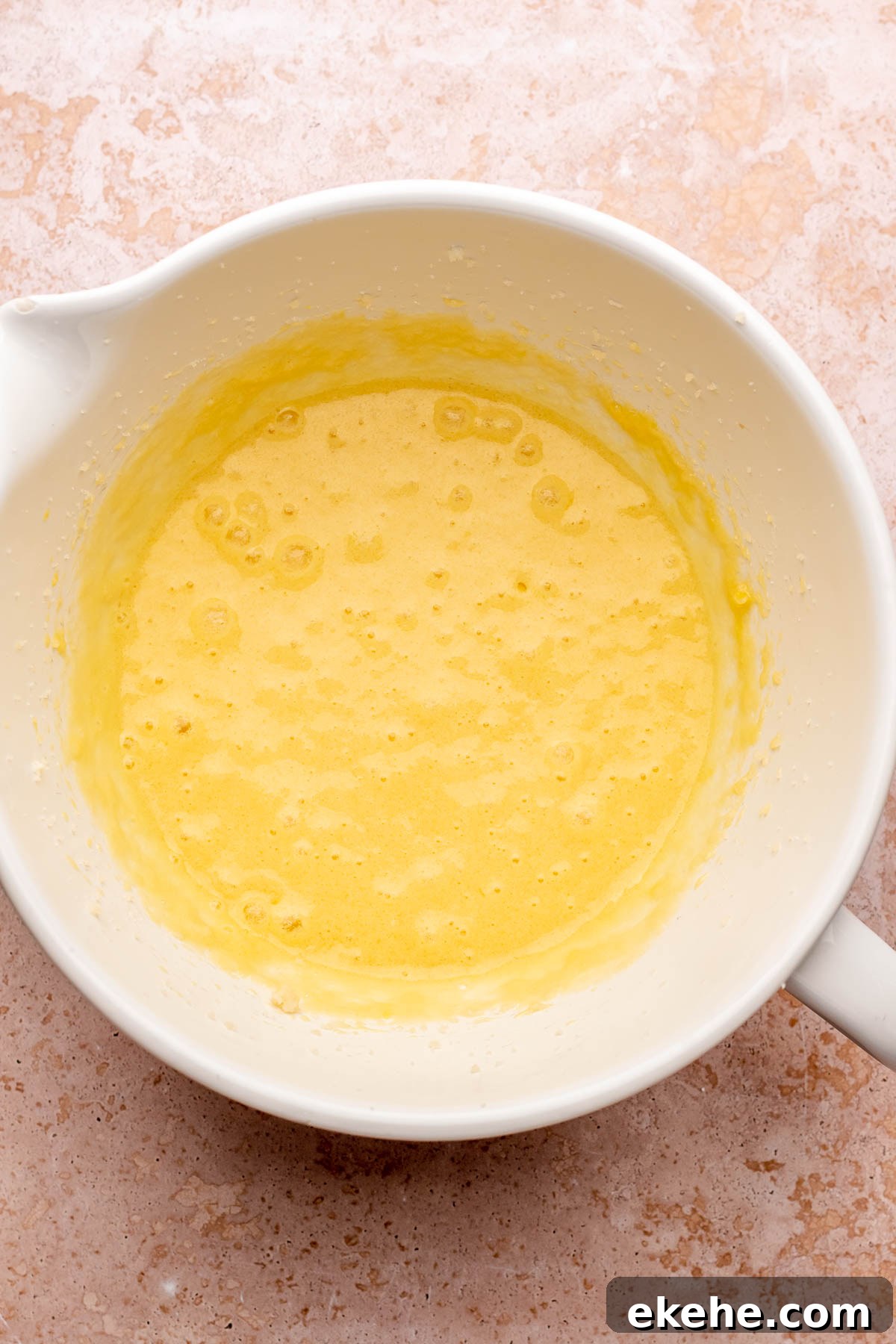 Creamed cake batter in a bowl.