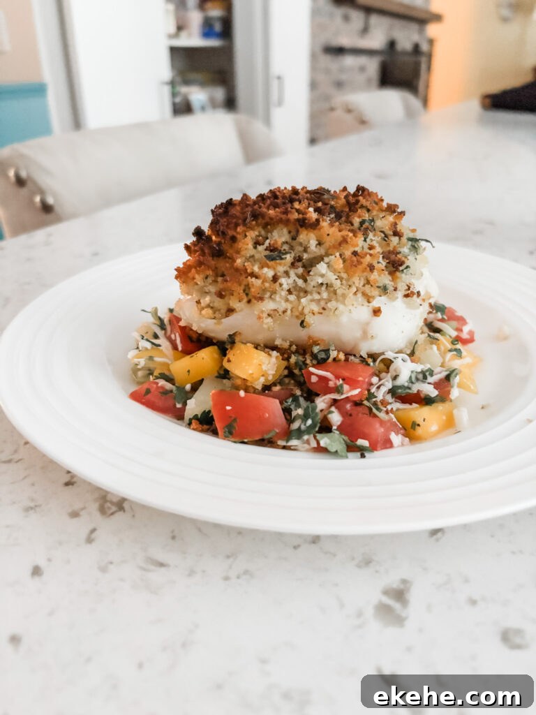 The finished Broiled Panko Halibut accompanied with a tropical salsa