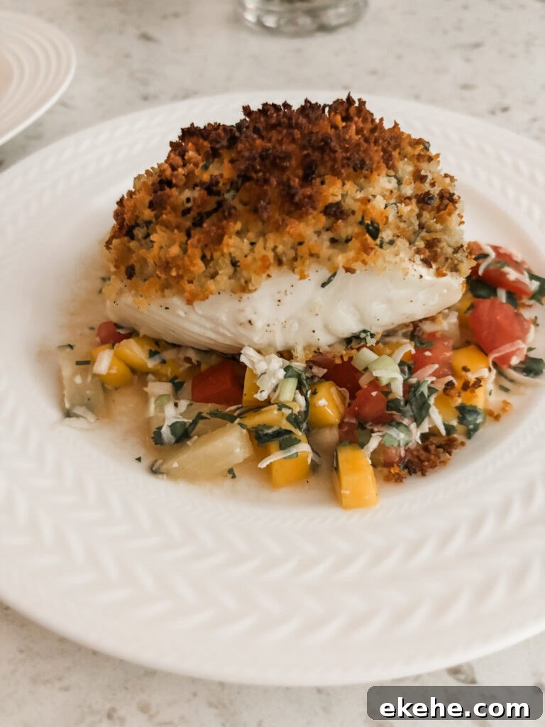 The finished Broiled Panko Halibut accompanied with a tropical salsa